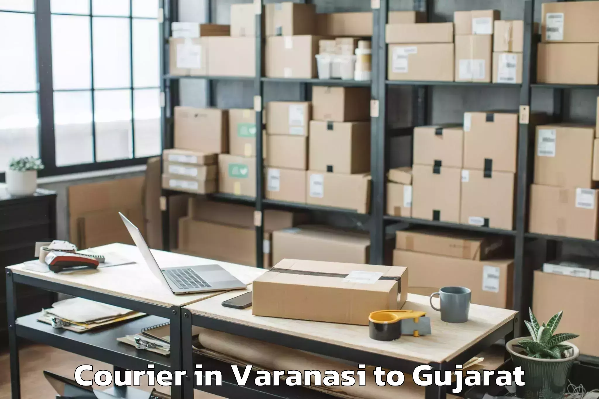 Get Varanasi to Hansot Courier